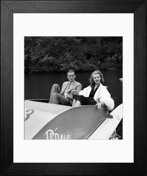 Framed Print : Marquess of bath with mary castle in a pedalo boat on the lake at longleat park Framed Print : Marquess of bath with mary castle in a pedalo boat on the lake at longleat park