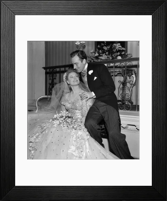 Framed Print : Anna Neagle and Michael Wilding as bride and groom in Maytime in Mayfair Framed Print : Anna Neagle and Michael Wilding as bride and groom in Maytime in Mayfair