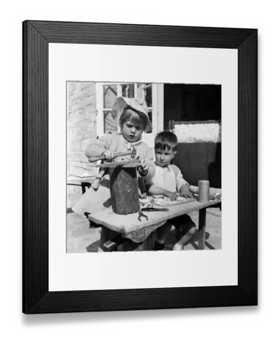 Framed Print : Annette Wran is an expert for her 3 years with hammer, nails, and wood Framed Print : Annette Wran is an expert for her 3 years with hammer, nails, and wood