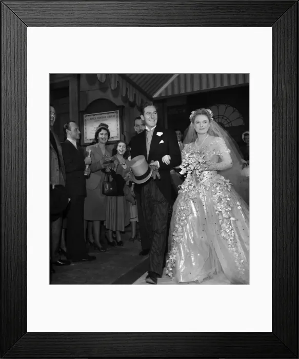 Framed Print : Anna Neagle and Michael Wilding as a bride and groom in Maytime in Mayfair Framed Print : Anna Neagle and Michael Wilding as a bride and groom in Maytime in Mayfair