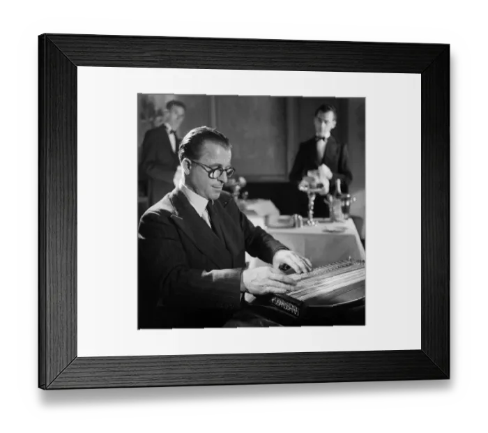 Framed Print : Anton Karas playing the zither at Londons Empress Club Framed Print : Anton Karas playing the zither at Londons Empress Club