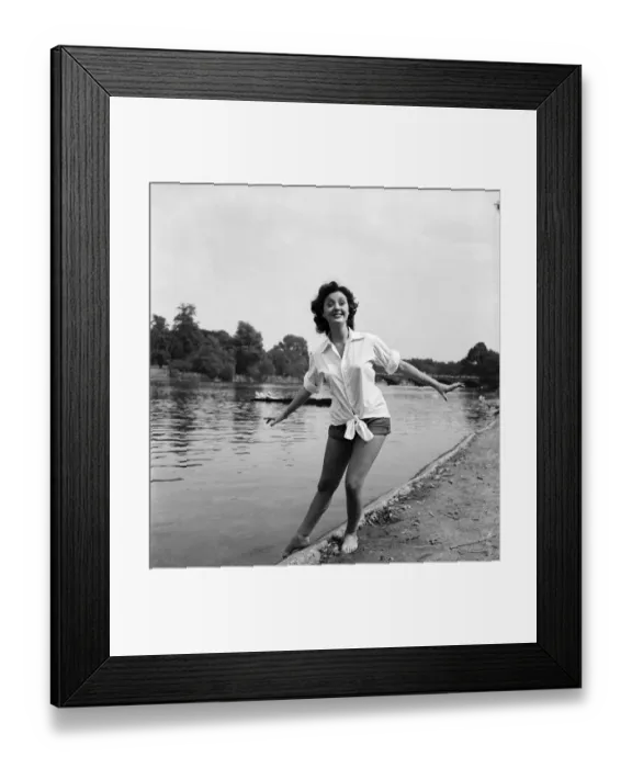 Framed Print : Actress Lana Morris wears a shirt over her shorts. August 1949 O20168-002 Framed Print : Actress Lana Morris wears a shirt over her shorts. August 1949 O20168-002
