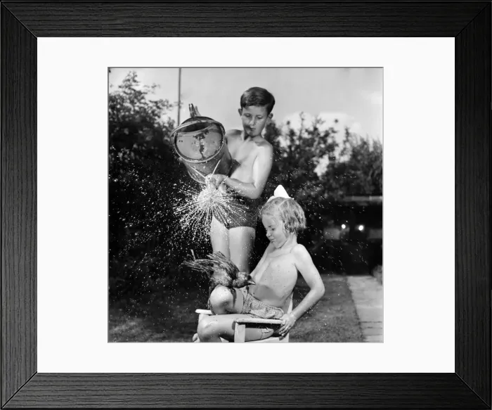 Framed Print : Michael and Audrey Paislow with their pet Pat Jackdaw. July 1950 O24817 Framed Print : Michael and Audrey Paislow with their pet Pat Jackdaw. July 1950 O24817