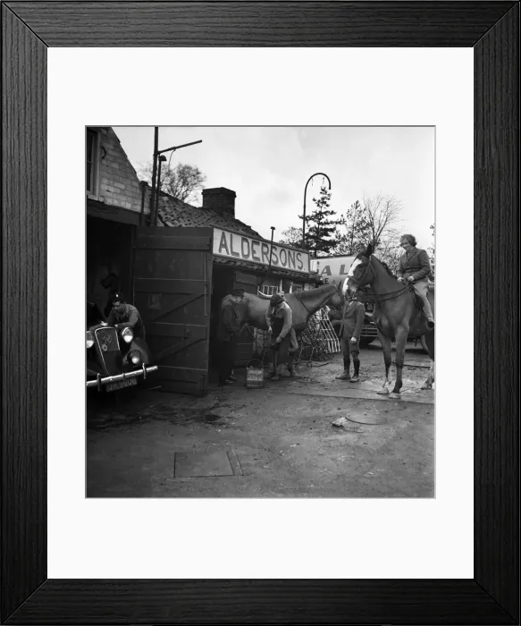 Framed Print : A horse being re-shoed by a blacksmith at his forge January 1948. O22134-001 Framed Print : A horse being re-shoed by a blacksmith at his forge January 1948. O22134-001