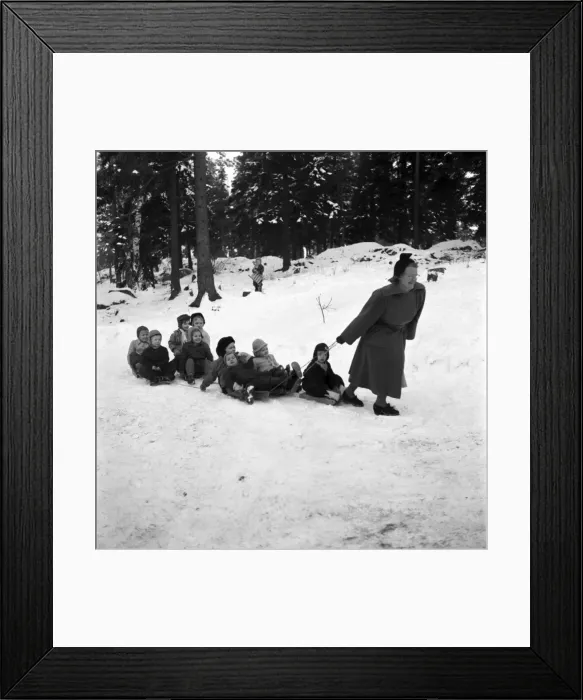 Framed Print : Kasin Eriksson, Swedish Childrens nurse seen here playing in the snow Framed Print : Kasin Eriksson, Swedish Childrens nurse seen here playing in the snow