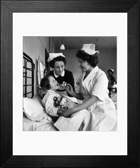 Framed Print : Teenagers doing work experience as nurses. The work experience scheme has been introduced Framed Print : Teenagers doing work experience as nurses. The work experience scheme has been introduced