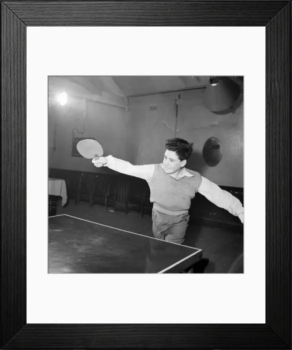 Framed Print : Young boy playing table tennis. January 1953 D232