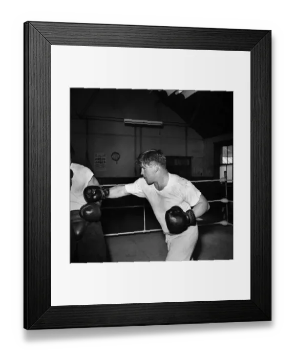 Framed Print : Boxer Don Cockell seen here Training in a Brighton Gym for his next fight his sparring