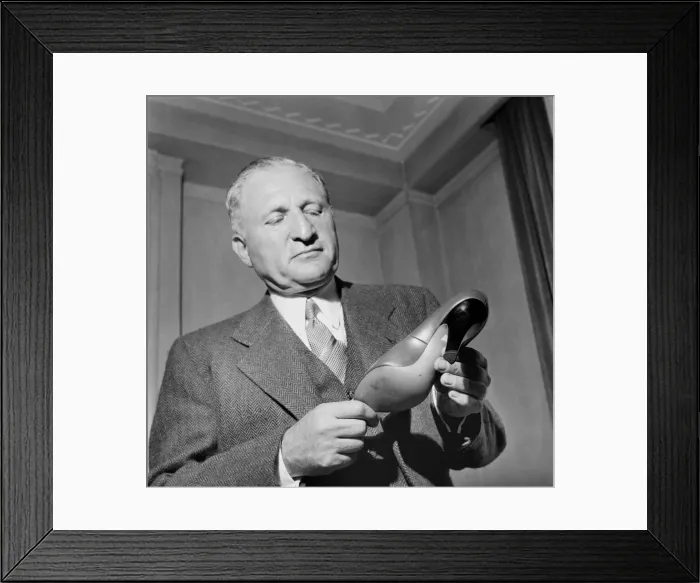 Framed Print : Mr. Maurice Miller with the Stiletto shoe. Note the tiny heels Framed Print : Mr. Maurice Miller with the Stiletto shoe. Note the tiny heels