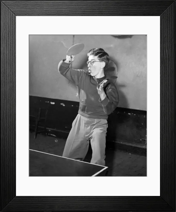 Framed Print : Young boy playing table tennis. January 1953 D232-001 Framed Print : Young boy playing table tennis. January 1953 D232-001