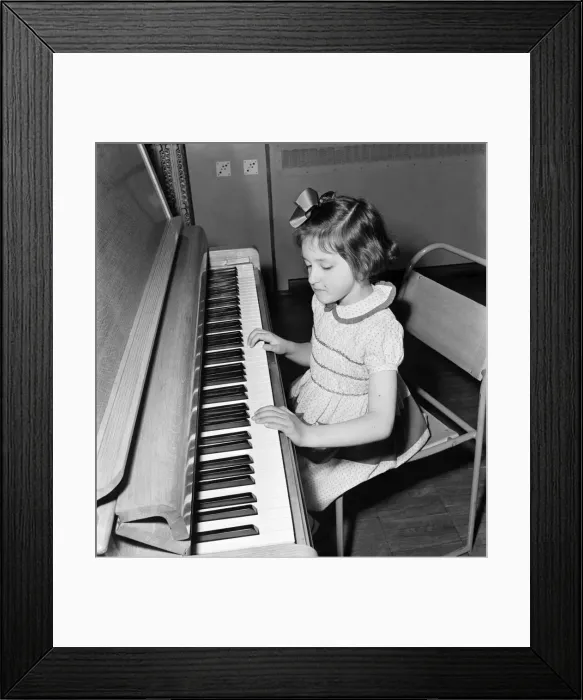 Framed Print : Talented Children. Elizabeth Bick 6. 5 year old pianist performing for her friends Framed Print : Talented Children. Elizabeth Bick 6. 5 year old pianist performing for her friends