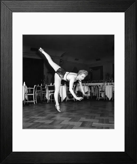 Framed Print : An Ice Skating Clown performing above parquet flooring. January 1953 D597-007 Framed Print : An Ice Skating Clown performing above parquet flooring. January 1953 D597-007