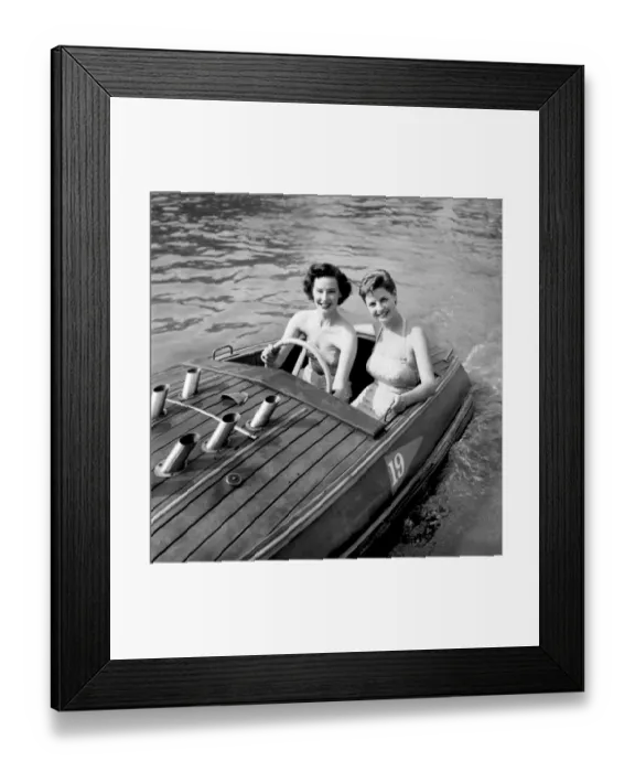 Framed Print : Holiday Two young women enjoying the boating pool at the Festival pleasure gardens Framed Print : Holiday Two young women enjoying the boating pool at the Festival pleasure gardens