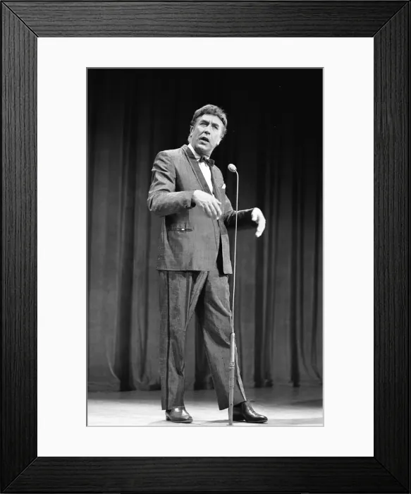 Framed Print : British comedian Frankie Howerd performs on stage during rehearsals for the Royal Variery