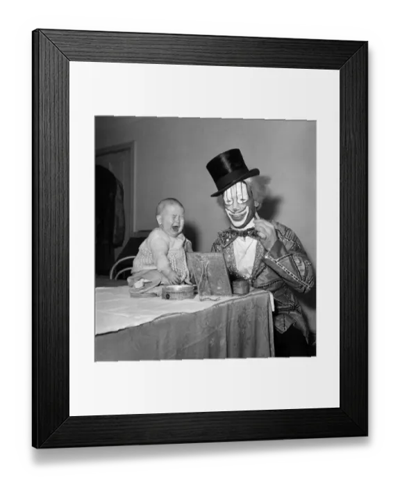 Framed Print : Wimpey the clown seen here with his baby daughter Rosalind