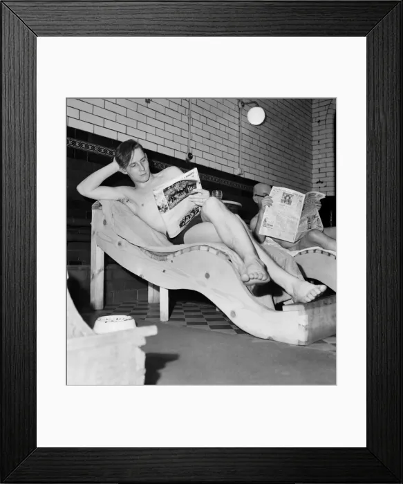 Framed Print : Turkish bath assistant Ernest Smith reading his newspaper. January 1953 D259 Framed Print : Turkish bath assistant Ernest Smith reading his newspaper. January 1953 D259