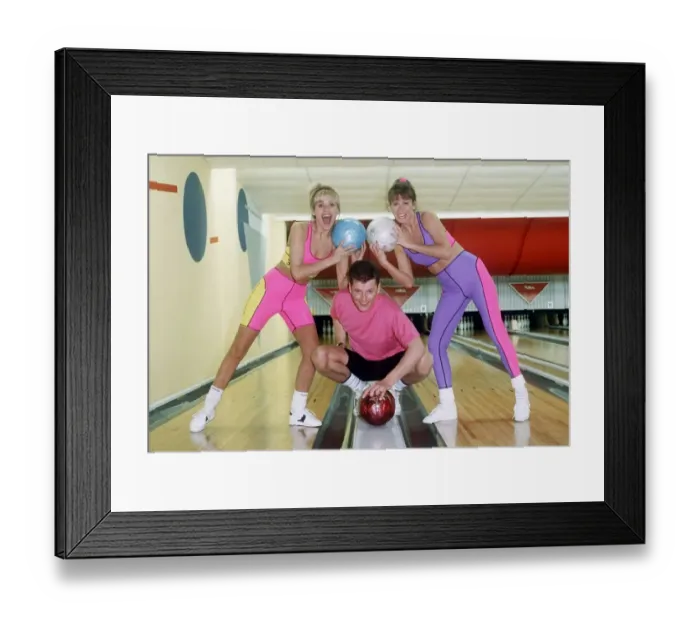 Framed Print : Fashion sportswear 1989 models in ten pin bowling alley multi coloured shorts crop tops