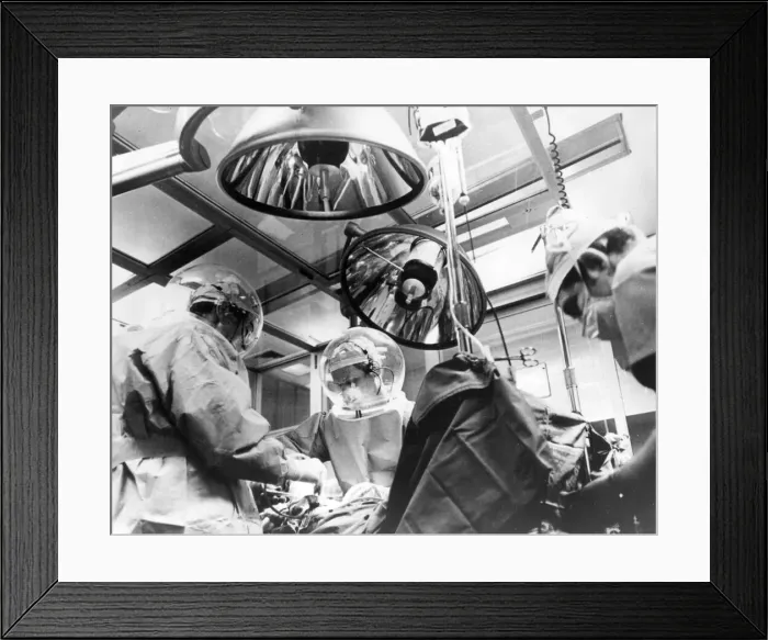 Framed Print : A surgery team at St Lukes Hospital in Denver performs a hip-joint replacement Framed Print : A surgery team at St Lukes Hospital in Denver performs a hip-joint replacement