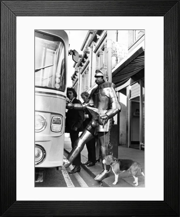 Framed Print : This knight causes a stir as he gets on a bus