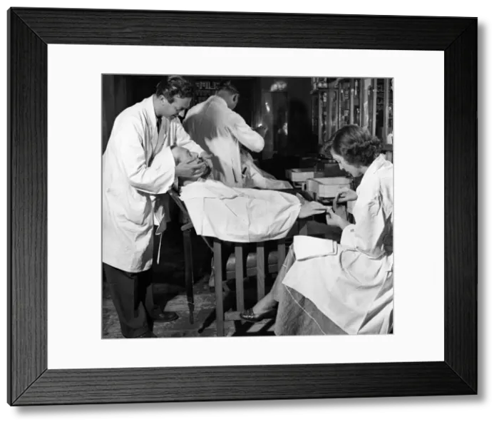 Framed Print : Male Grooming : Barbers. A customer having a Shave and a manicure at Cliffords Framed Print : Male Grooming : Barbers. A customer having a Shave and a manicure at Cliffords