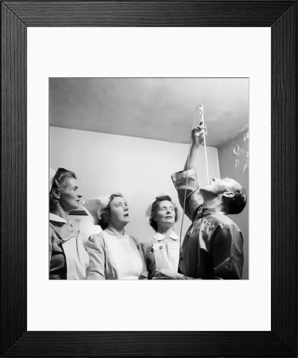 Framed Print : Entertainment : Sword Swallowing. Maurice Jarvis, 35, Demonstrates to the amazed nurses Framed Print : Entertainment : Sword Swallowing. Maurice Jarvis, 35, Demonstrates to the amazed nurses