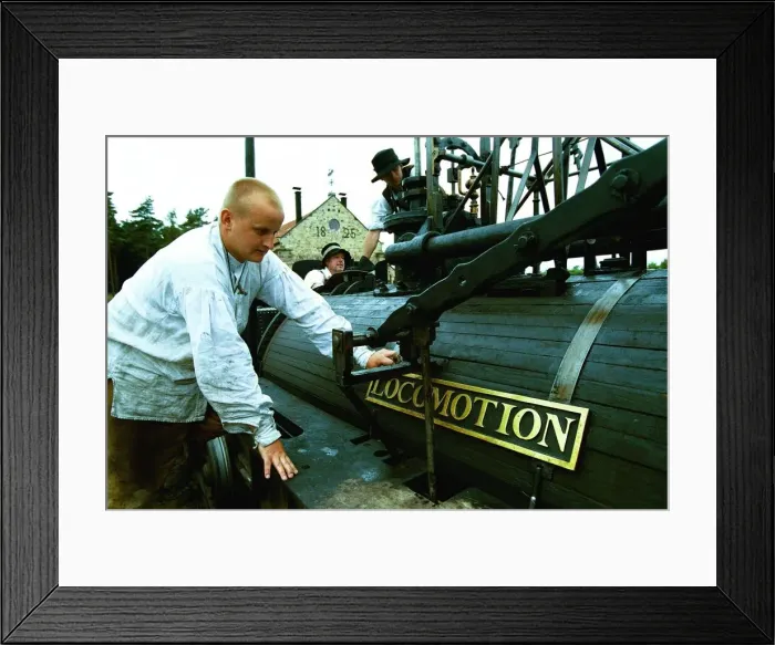 Framed Print : Joseph Welsh polishes the replica Locomotion No. 1 name plate at Beamish Museum