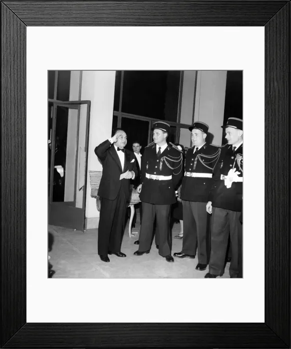 Framed Print : American Actor Edward G Robinson seen here saluting French Policeman. D3118-022