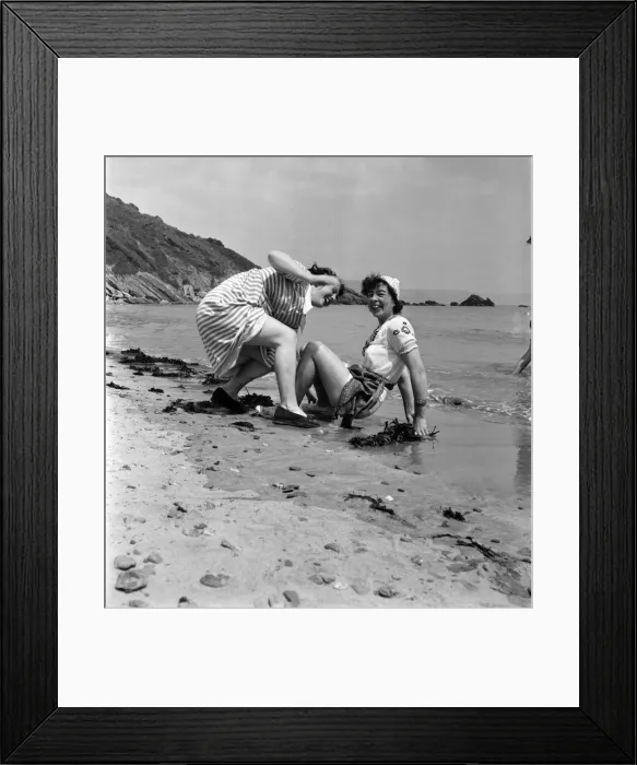 Framed Print : Holiday makes enjoying themselves on a Cornish beach. June 1953 D3025 Framed Print : Holiday makes enjoying themselves on a Cornish beach. June 1953 D3025