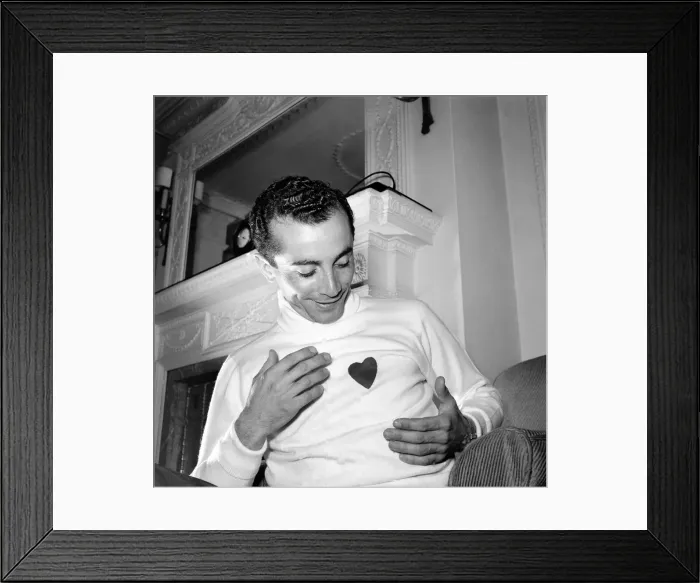 Framed Print : Al Martino admires his new sweater. June 1953 D2956-002