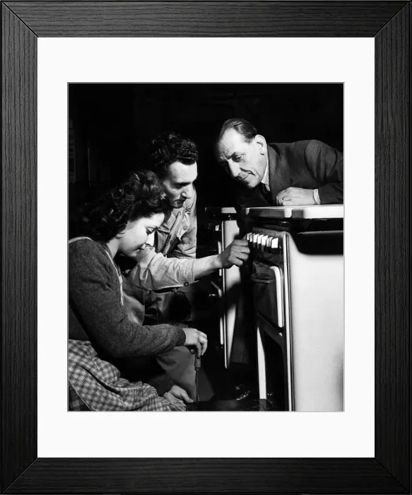 Framed Print : Carlo Brambilla inspects one of the electric cooking ranges his plant manufactures Framed Print : Carlo Brambilla inspects one of the electric cooking ranges his plant manufactures