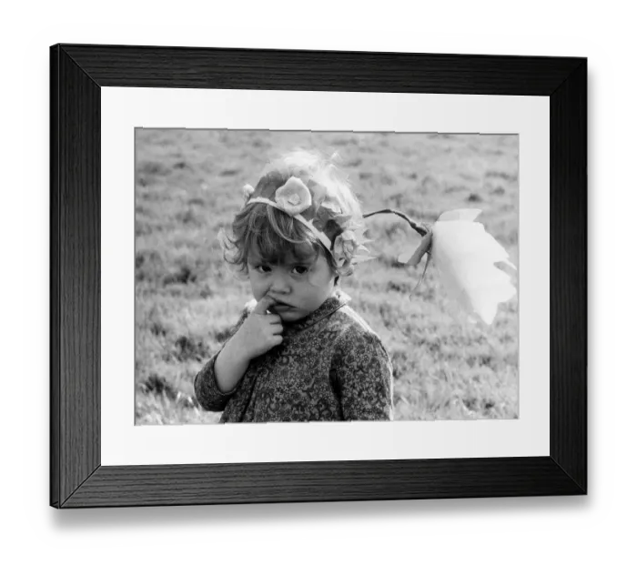 Framed Print : Saskia Webster - March 1972 aged two doesn t look at all sure about her new Framed Print : Saskia Webster - March 1972 aged two doesn t look at all sure about her new