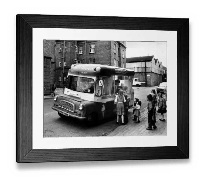 Framed Print : Ice cream man in his van is one of the few highlights in the lives of children who Framed Print : Ice cream man in his van is one of the few highlights in the lives of children who