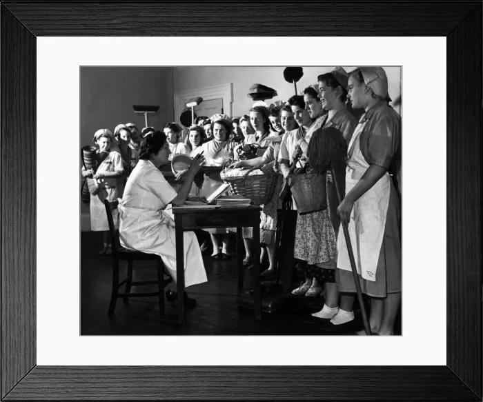 Framed Print : Mops and brooms stand to attention. Institute of Houseworkers in Croydon where Framed Print : Mops and brooms stand to attention. Institute of Houseworkers in Croydon where