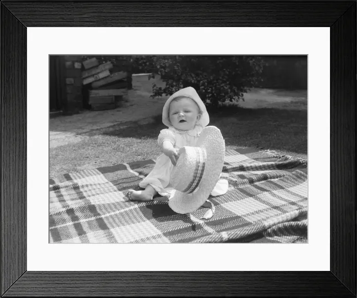 Framed Print : Baby with large straw hat 14 / 6 / 1950 024591 / 4 Framed Print : Baby with large straw hat 14 / 6 / 1950 024591 / 4