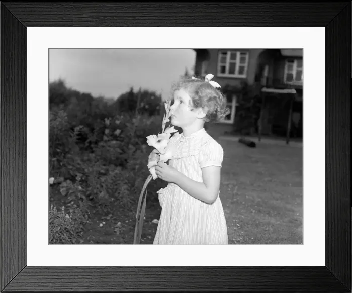 Framed Print : Children at Sunshine Home for blind Babies. Sheila, 5 with gladioli flower Framed Print : Children at Sunshine Home for blind Babies. Sheila, 5 with gladioli flower