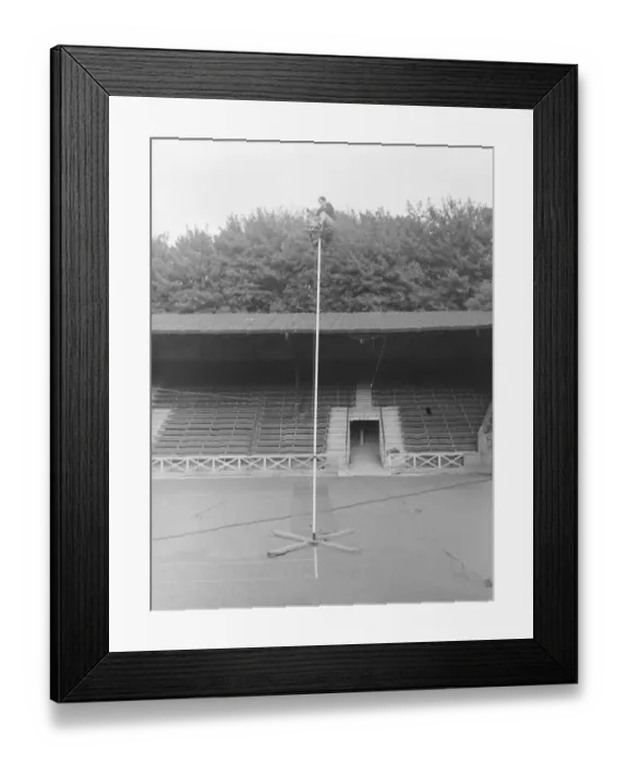 Framed Print : The Great Reno sitting on top of a 60 ft pole at Brighton Zoo after an arguement with his Framed Print : The Great Reno sitting on top of a 60 ft pole at Brighton Zoo after an arguement with his