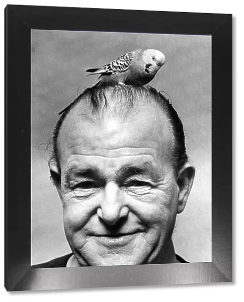 Joey the budgerigar on top of Mr Farriess head. 4th December 1975