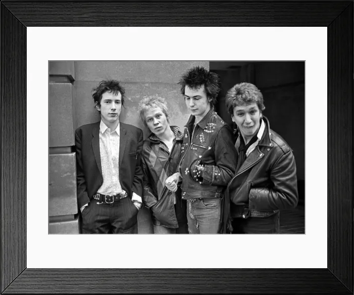 Framed Print : Sex Pistols punk rock band seen here in a London Circa 1st May 1977 Left is