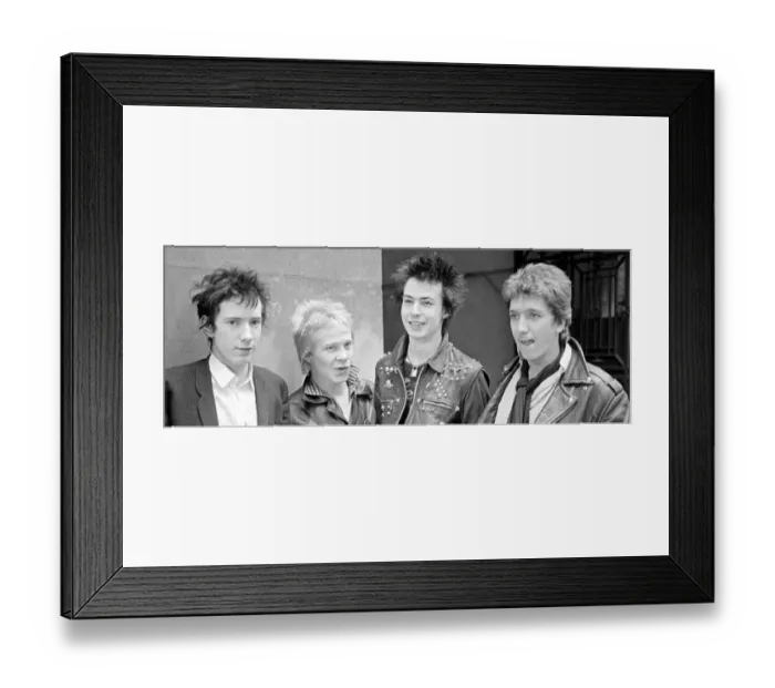 Framed Print : Sex Pistols punk rock band seen here in a London Circa 1st May 1977 Left is