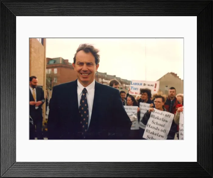 Framed Print : Tony Blair visits Benwell with Blakelaw School closure protestors in background