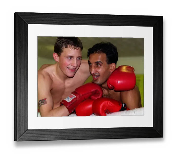 Framed Print : Tanveer Ahmed Glasgow lightweight Boxer with his arms round sparring partner Scott Dixon