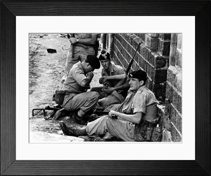 Framed Print : One of five British soldiers injured when a terrorist hurled a grenade at troops of Framed Print : One of five British soldiers injured when a terrorist hurled a grenade at troops of