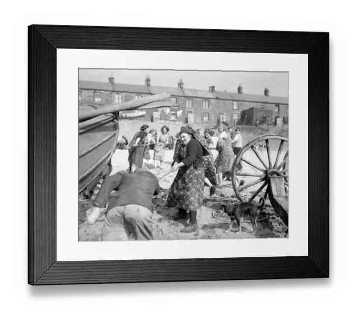 Framed Print : Fisherwomen of New Biggin, England hauling their boats ashore Women fulfilling