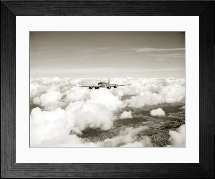 Framed Print : RAF Hastings aircraft flies through cloud cover far above the landscape below. Circa 1950 Framed Print : RAF Hastings aircraft flies through cloud cover far above the landscape below. Circa 1950
