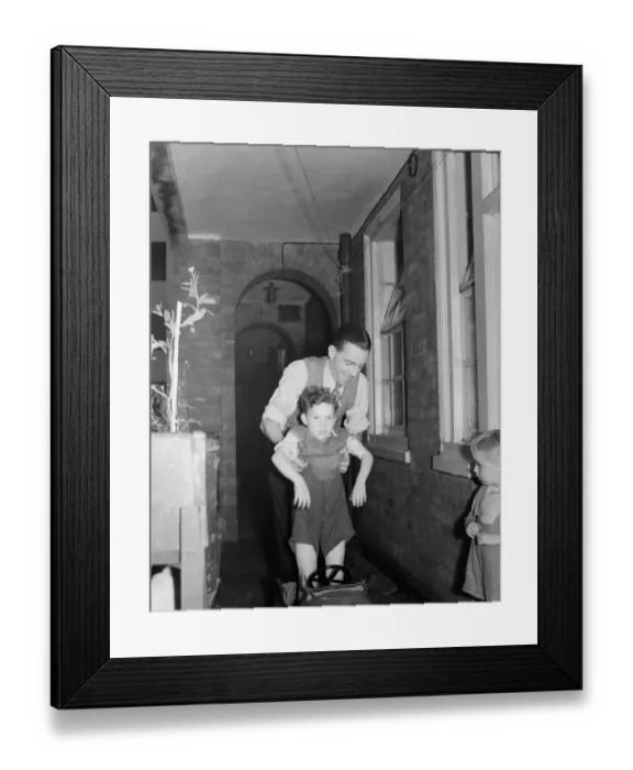 Framed Print : David Coles, whose wife is expecting quads with son David in London September 1950