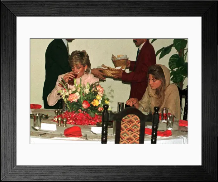 Framed Print : Diana, Princess of Wales at a restaurant for dinner with her friend Jemima Khan (right Framed Print : Diana, Princess of Wales at a restaurant for dinner with her friend Jemima Khan (right