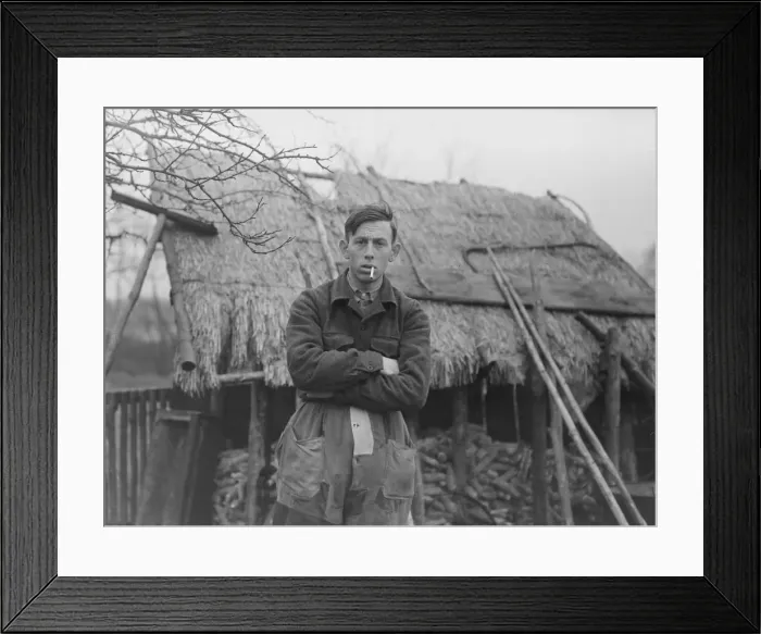 Framed Print : Antoon van den Hurk Mathematician Standing in front of thatched property with