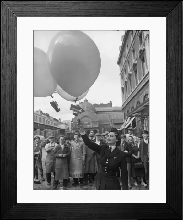 Framed Print : Air Hostess P Anns releases balloons carrying flowers and invitations to the Festival Framed Print : Air Hostess P Anns releases balloons carrying flowers and invitations to the Festival