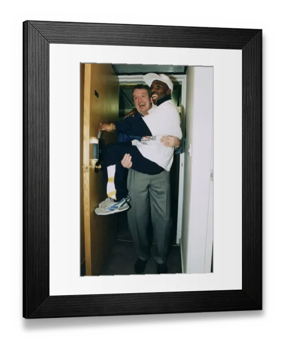Framed Print : Baby Jake Matlala boxer being carried througth door by fight promoter Tommy Gilmour Framed Print : Baby Jake Matlala boxer being carried througth door by fight promoter Tommy Gilmour