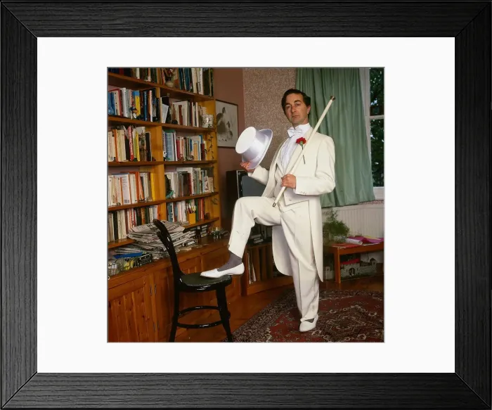 Framed Print : Tony Robinson actor October 1987 wearing white suit tails and hat holding walking stick